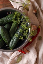 Photo of Fresh cucumbers, dill, garlic and pepper on table, flat lay. Pickling recipe
