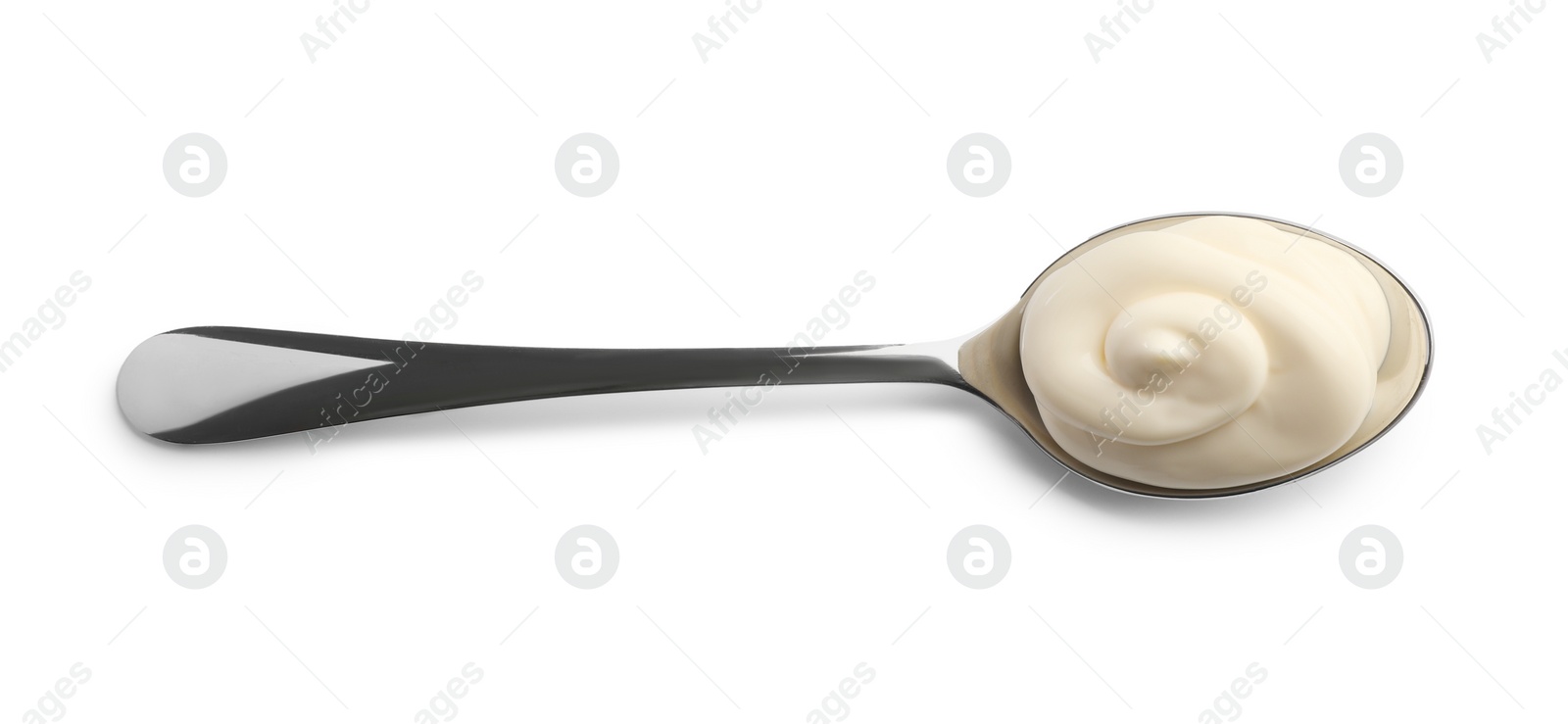 Photo of Natural yogurt in spoon isolated on white, top view