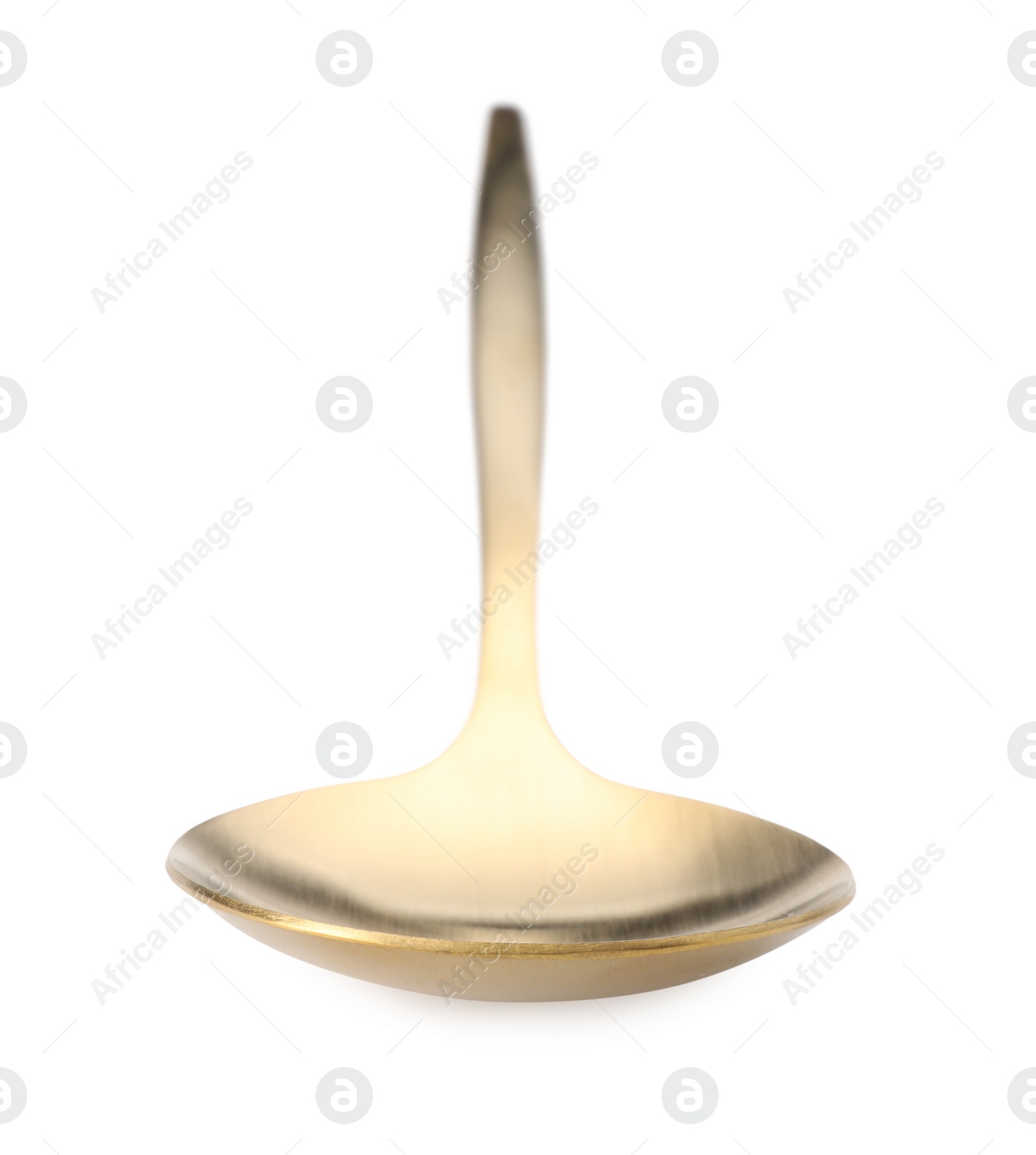 Photo of One shiny golden spoon isolated on white