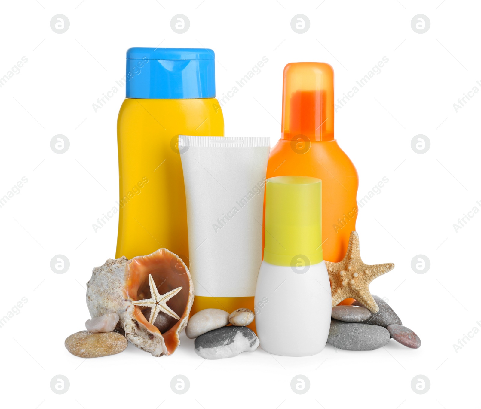 Photo of Different suntan products, seashell, starfishes and stones on white background