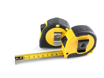 Photo of Measuring tapes on white background