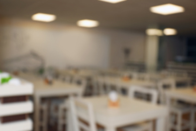 Photo of Blurred view of school canteen with new furniture