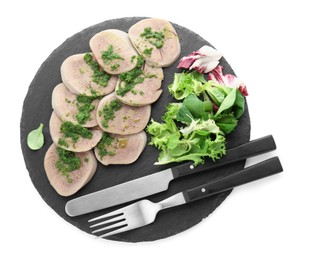 Photo of Tasty beef tongue pieces, salsa verde and salad isolated on white, top view