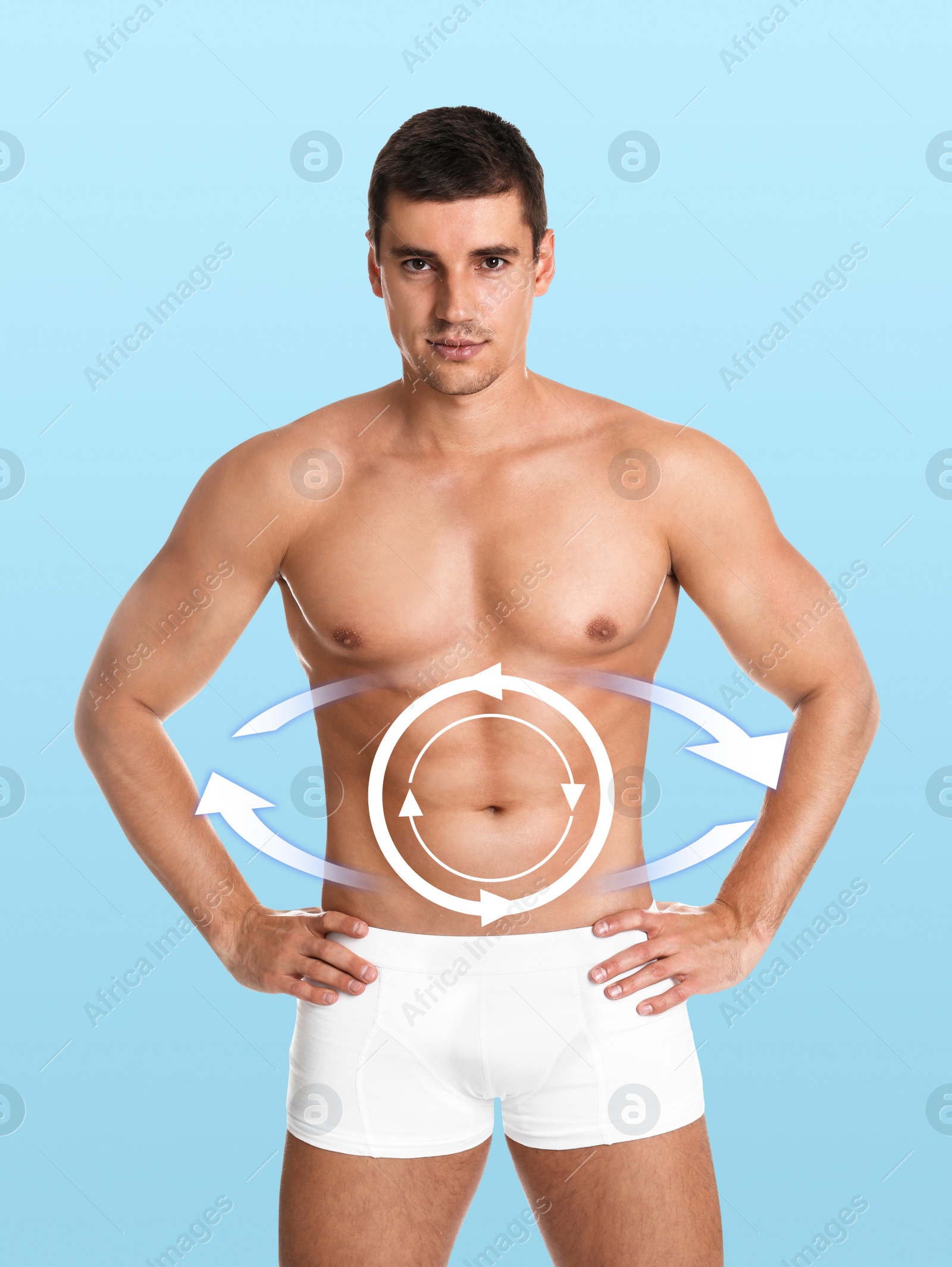 Image of Metabolism concept. Handsome man with perfect body on light blue background