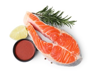 Photo of Fresh marinade, fish, lime and rosemary isolated on white, top view