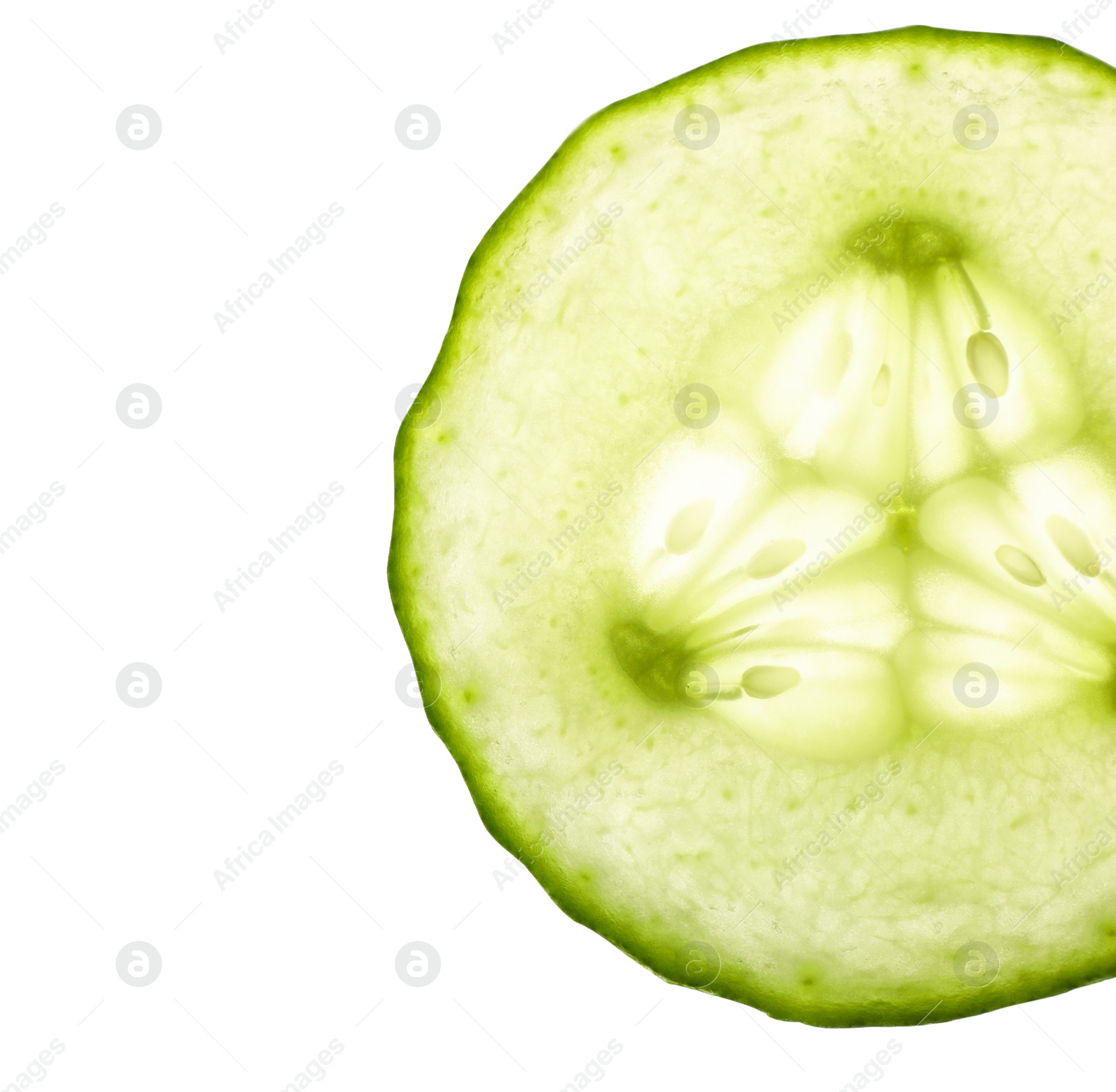 Photo of Slice of ripe cucumber on white background, top view