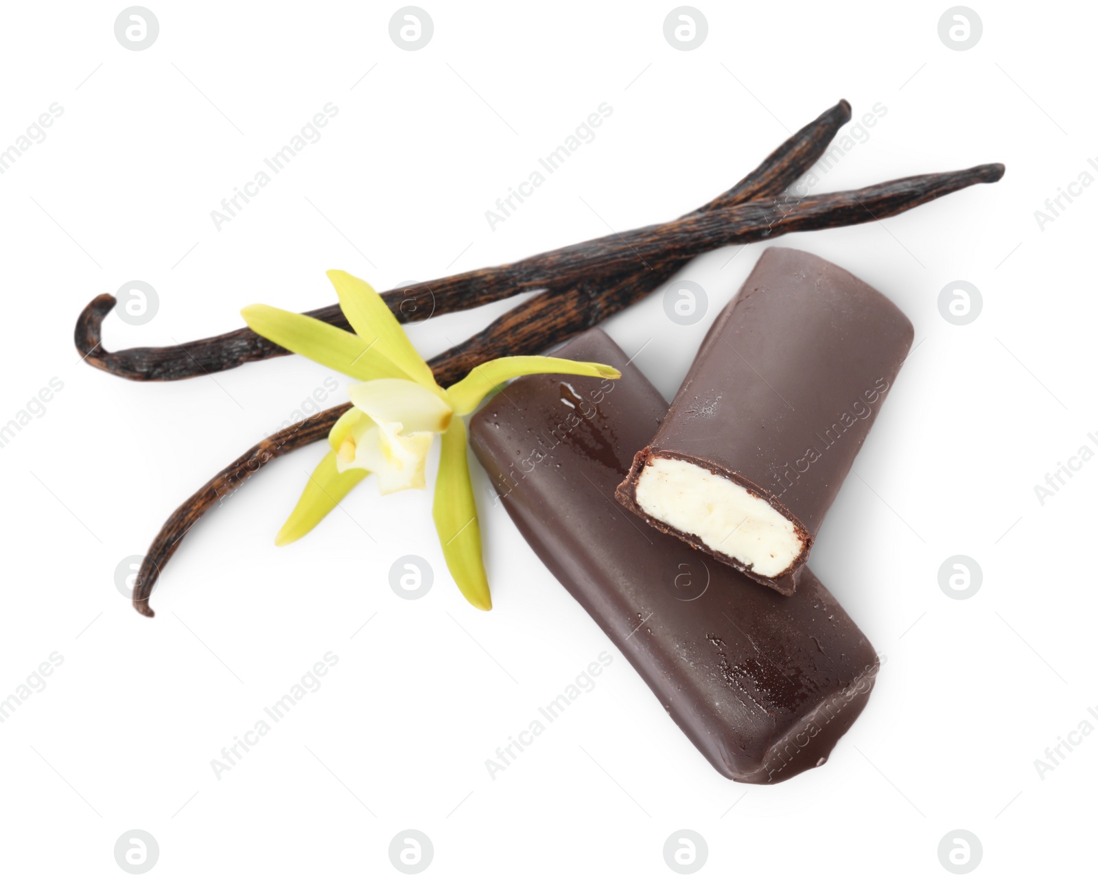 Photo of Glazed curd cheese bars, vanilla pods and flower isolated on white, top view