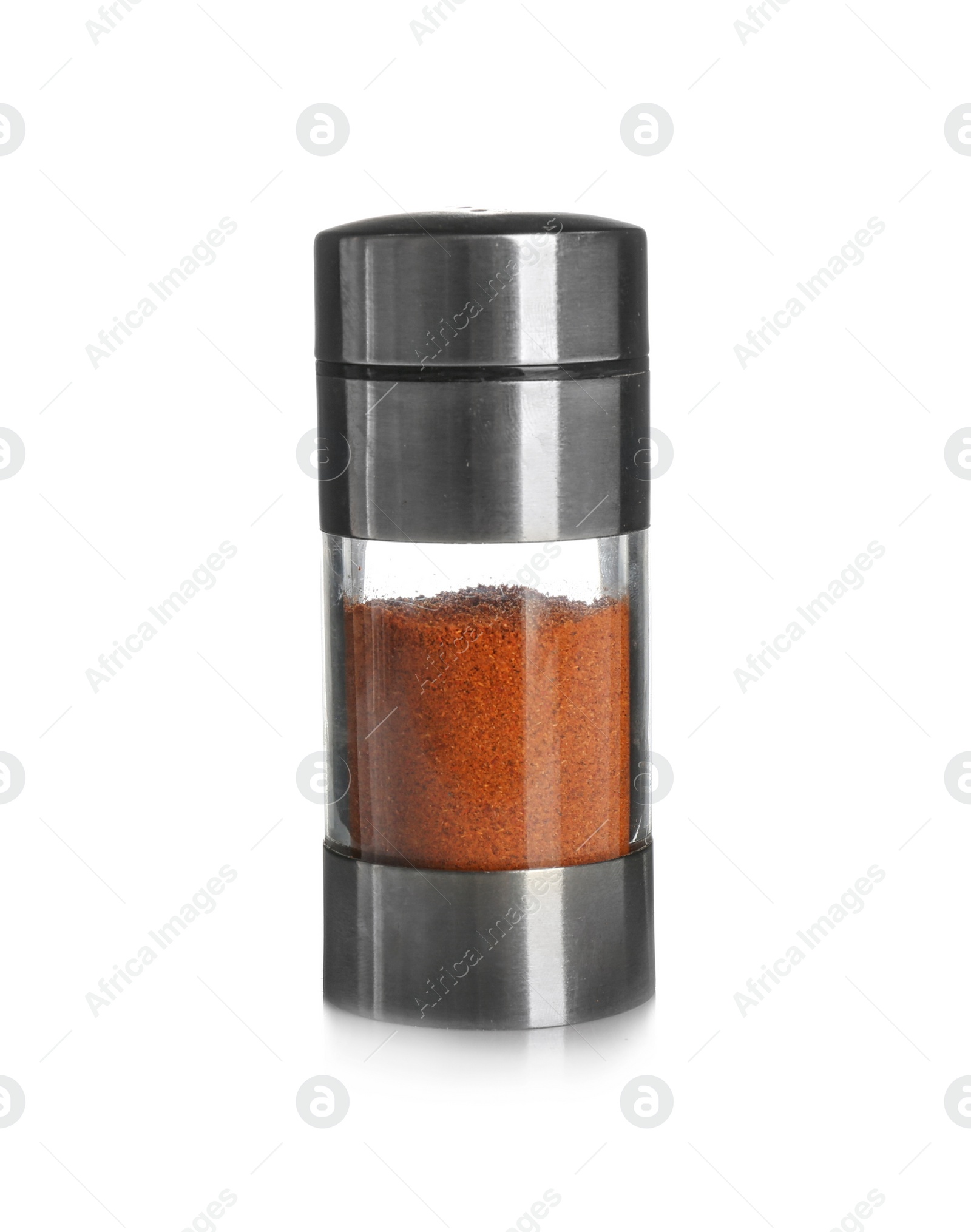 Photo of Shaker with aromatic pepper on white background