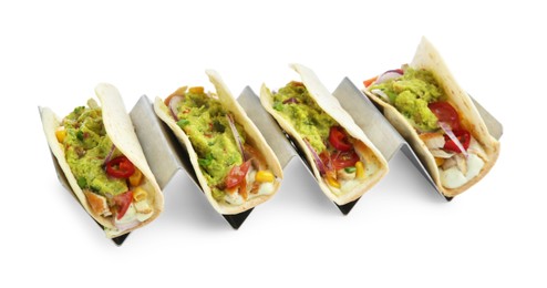 Delicious tacos with guacamole, meat and vegetables isolated on white