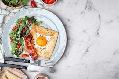 Photo of Delicious crepe with egg served on white marble table, flat lay. with space for text. Breton galette