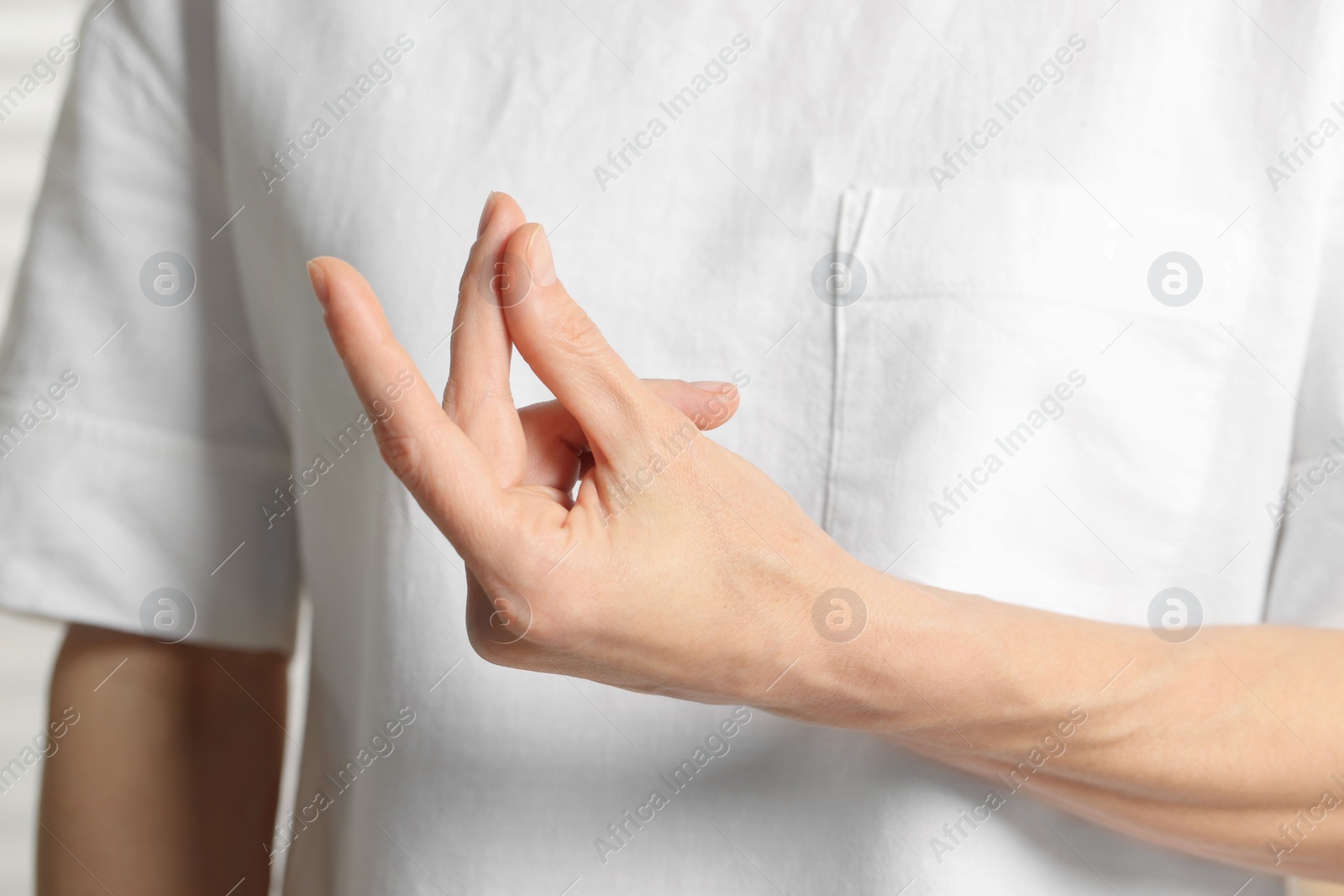 Photo of Closeup of woman snapping her fingers. Bad habit