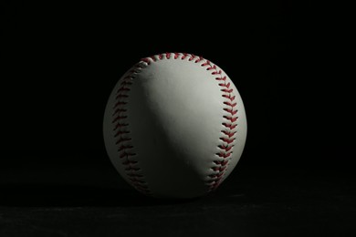 Baseball ball on black background. Sports game
