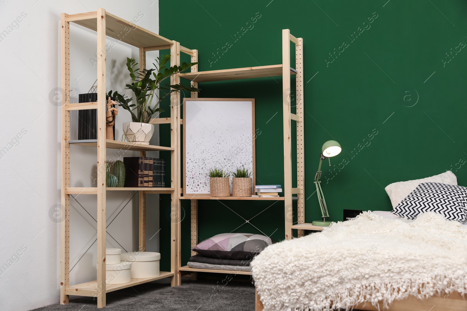 Photo of Wooden storage in stylish bedroom. Idea for interior design