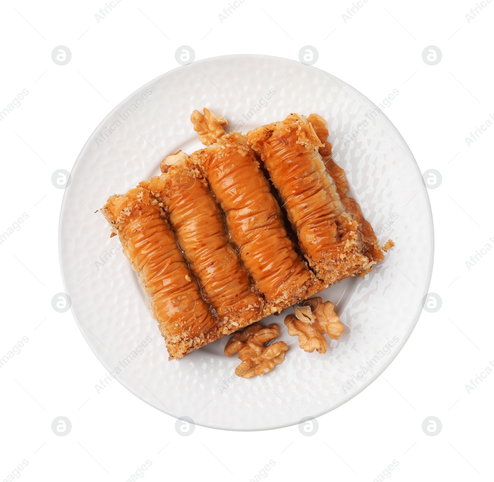 Photo of Eastern sweets. Pieces of tasty baklava isolated on white, top view