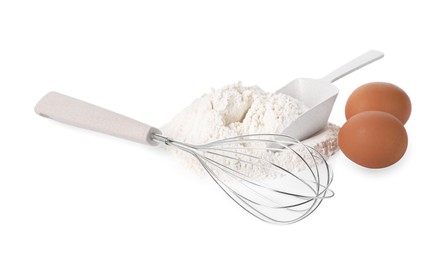 Photo of Whisk, raw eggs, flour and scoop isolated on white