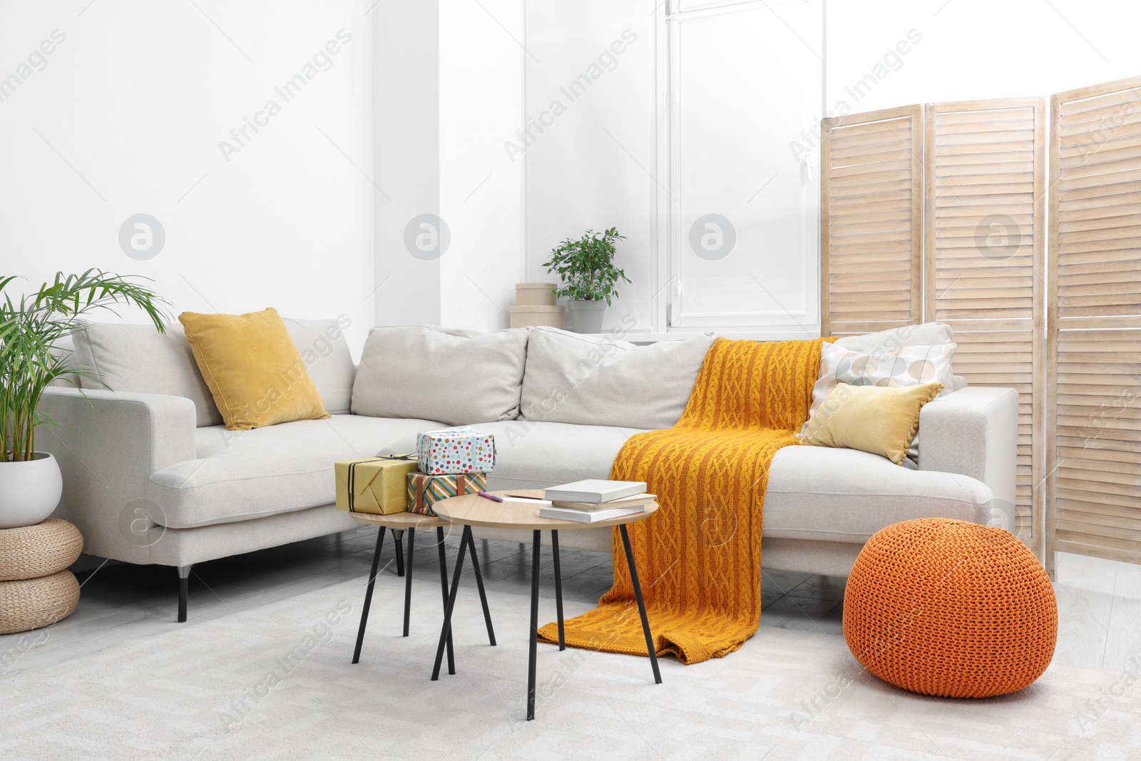 Photo of Gift boxes on table in living room