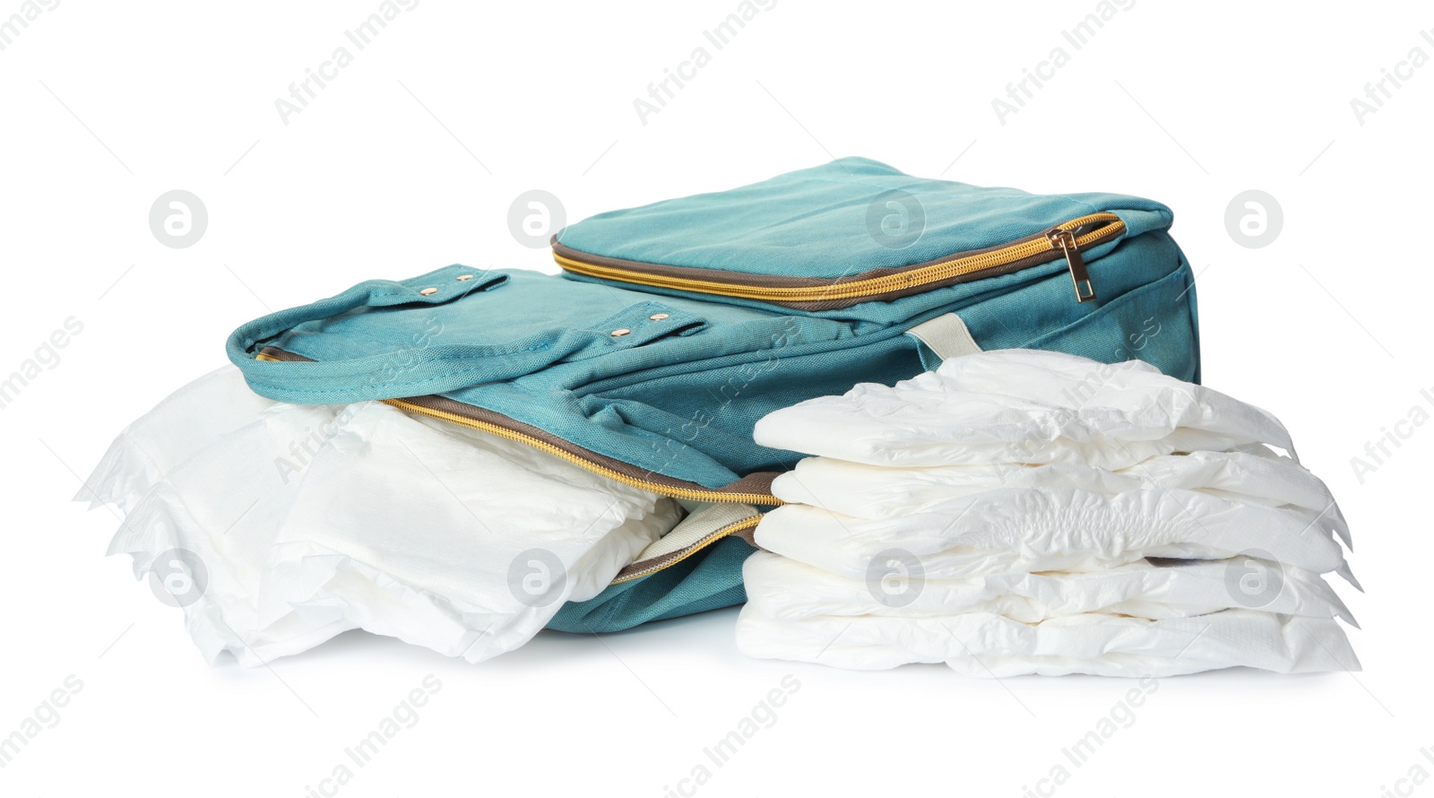 Photo of Backpack and disposable diapers on white background