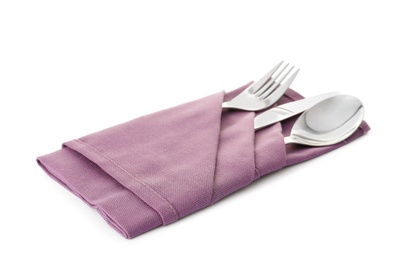 Photo of Folded napkin with fork, spoon and knife on white background