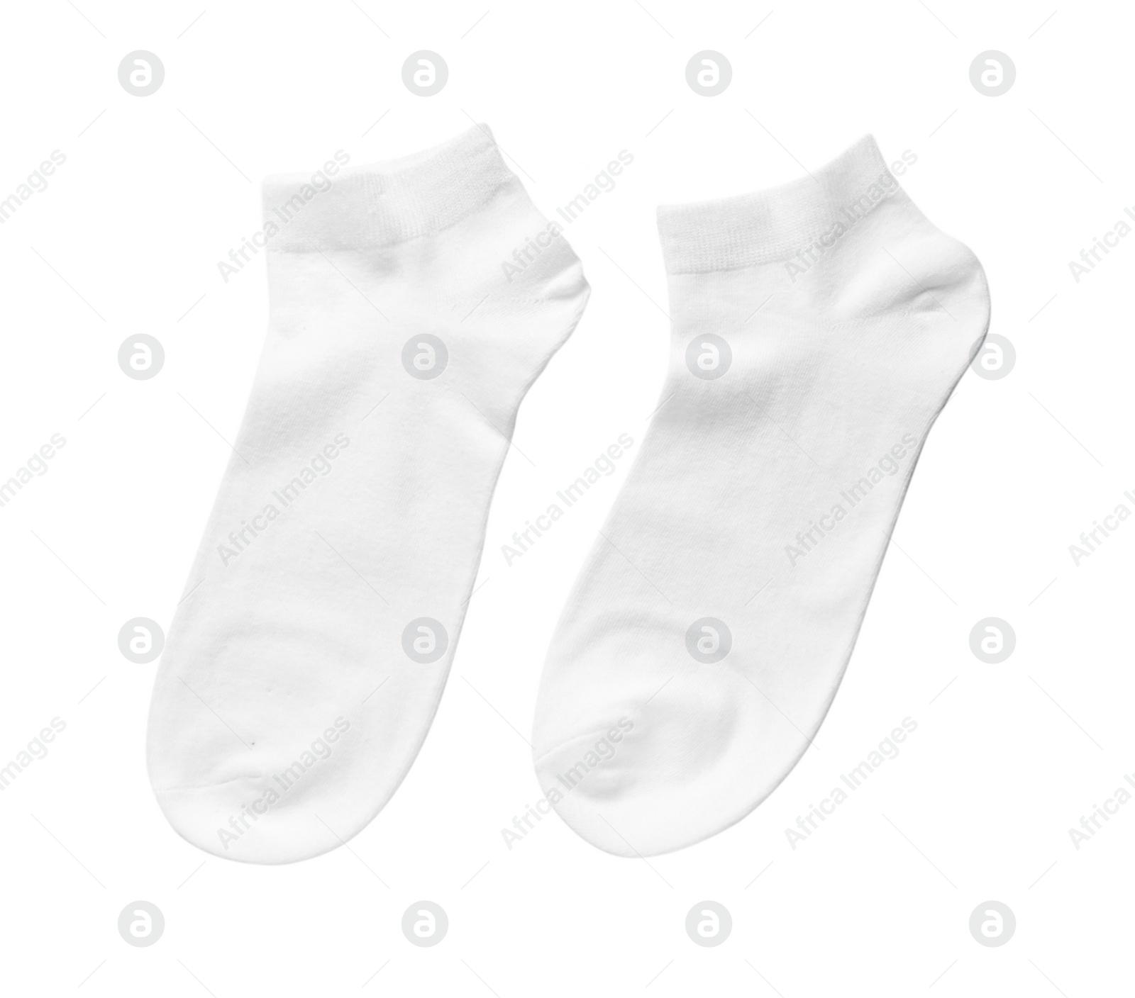 Photo of Pair of socks isolated on white, top view