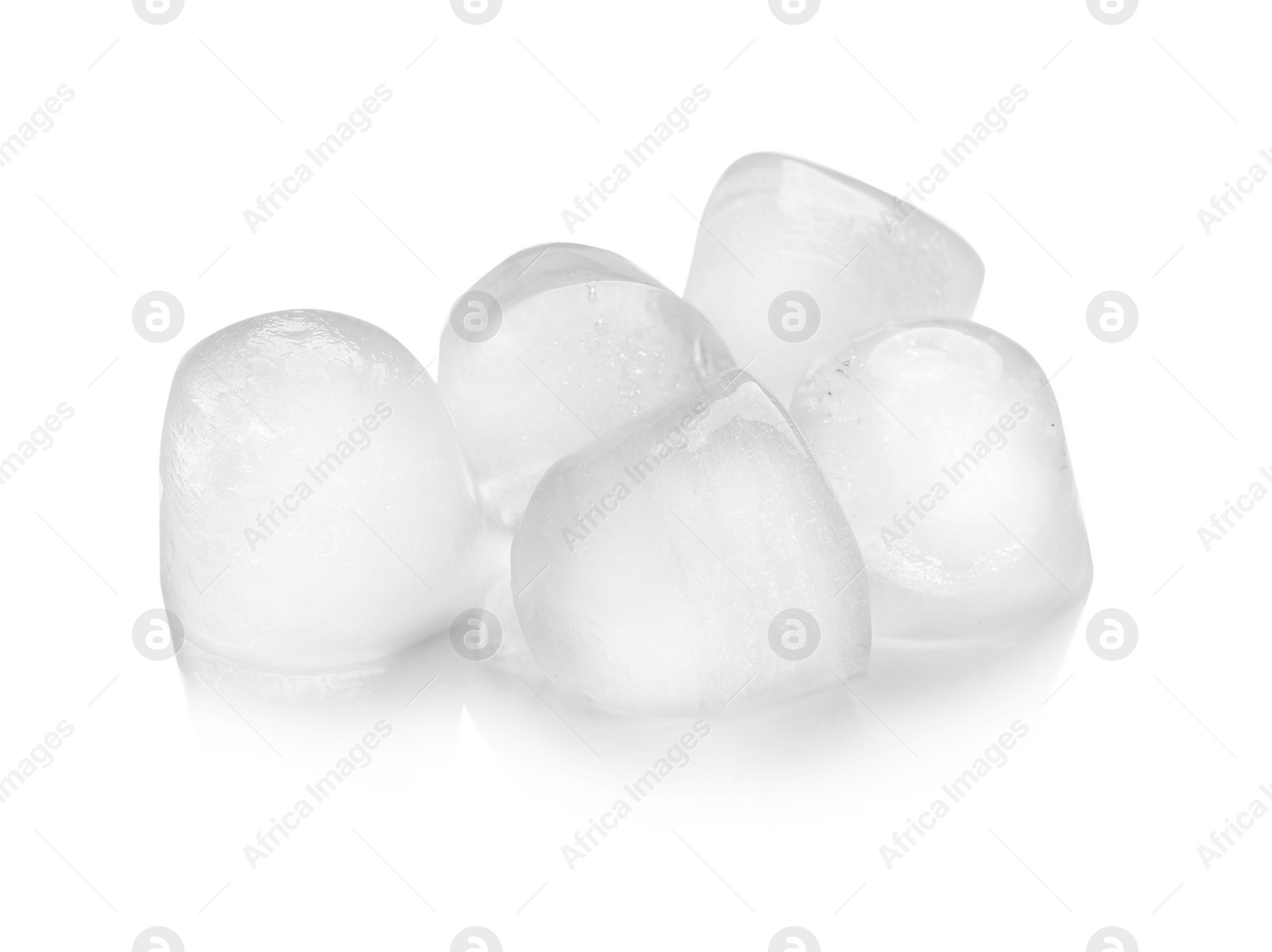 Photo of Pieces of ice melting on white background