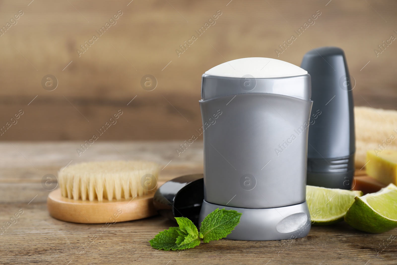 Photo of Composition with natural deodorants on wooden table