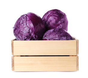 Photo of Wooden crate full of fresh red cabbages isolated on white