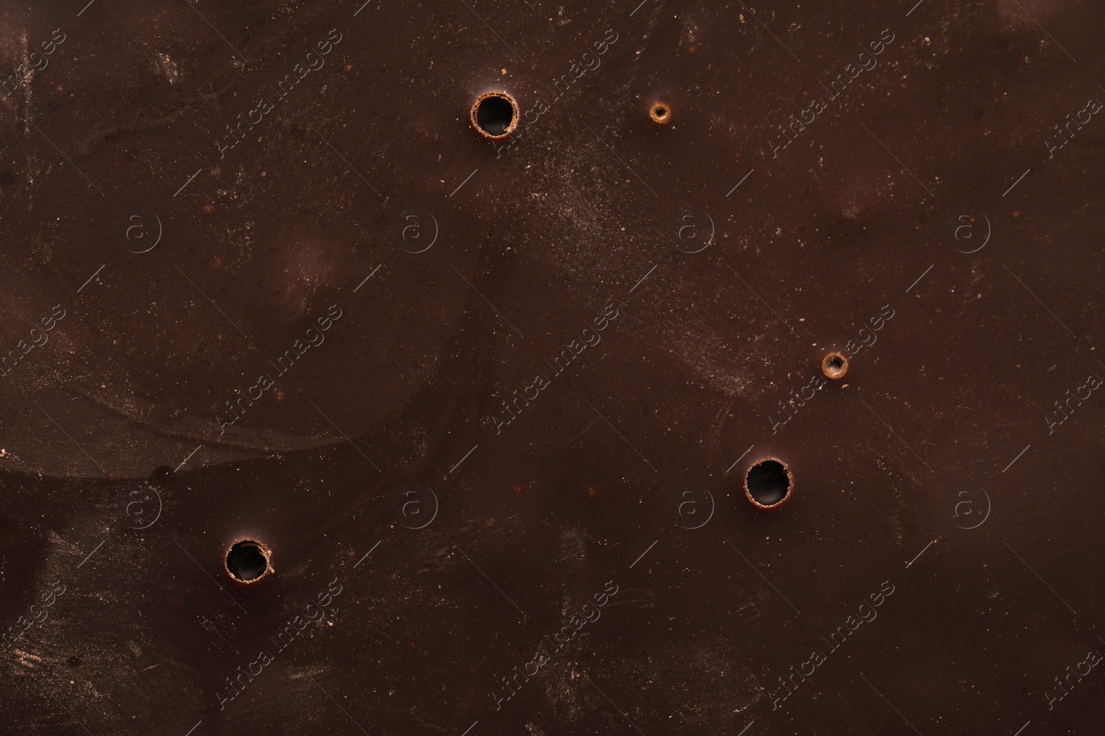 Photo of Tasty dark chocolate as background, closeup view