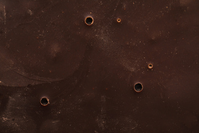Photo of Tasty dark chocolate as background, closeup view