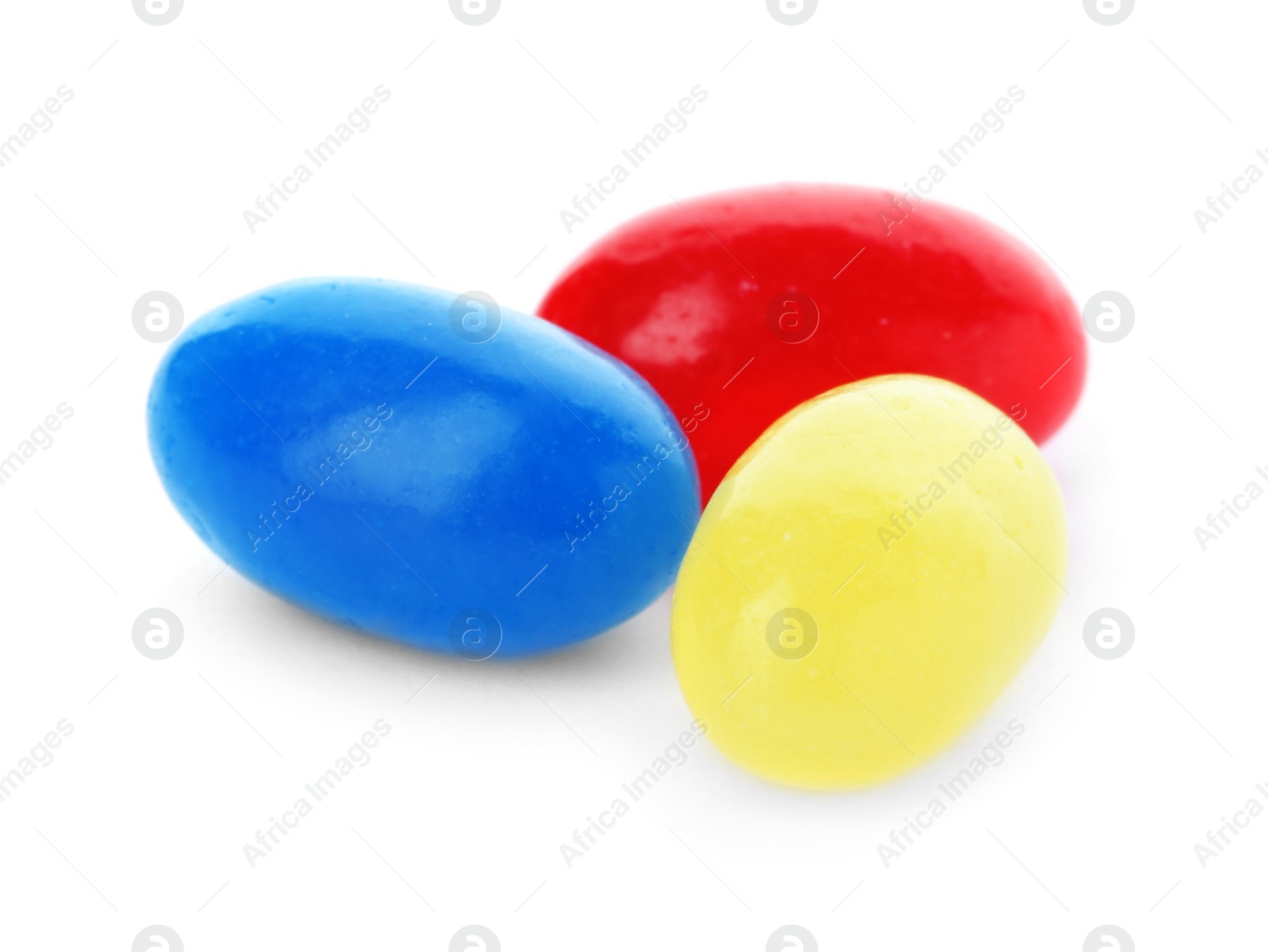 Photo of Delicious colorful dragee candies on white background