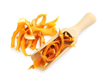 Scoop with dry orange peels on white background, top view