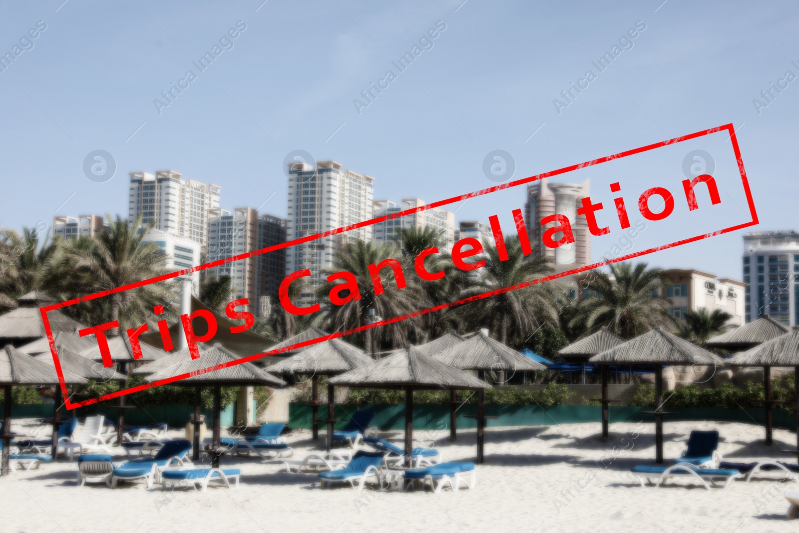 Image of Trips cancellation during coronavirus quarantine. Sandy beach with umbrellas