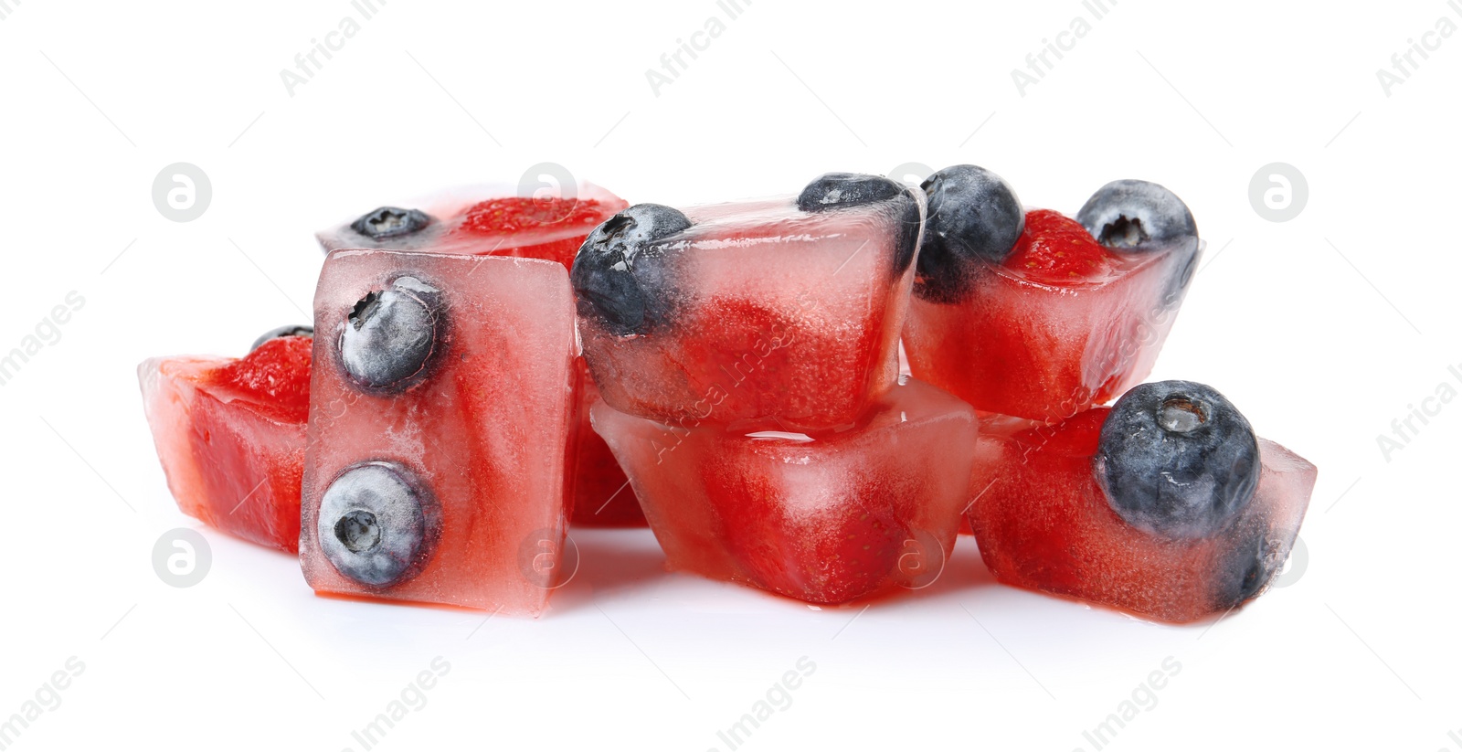 Photo of Ice cubes with berries on white background