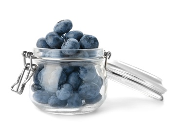 Photo of Glass jar full of fresh ripe blueberries on white background