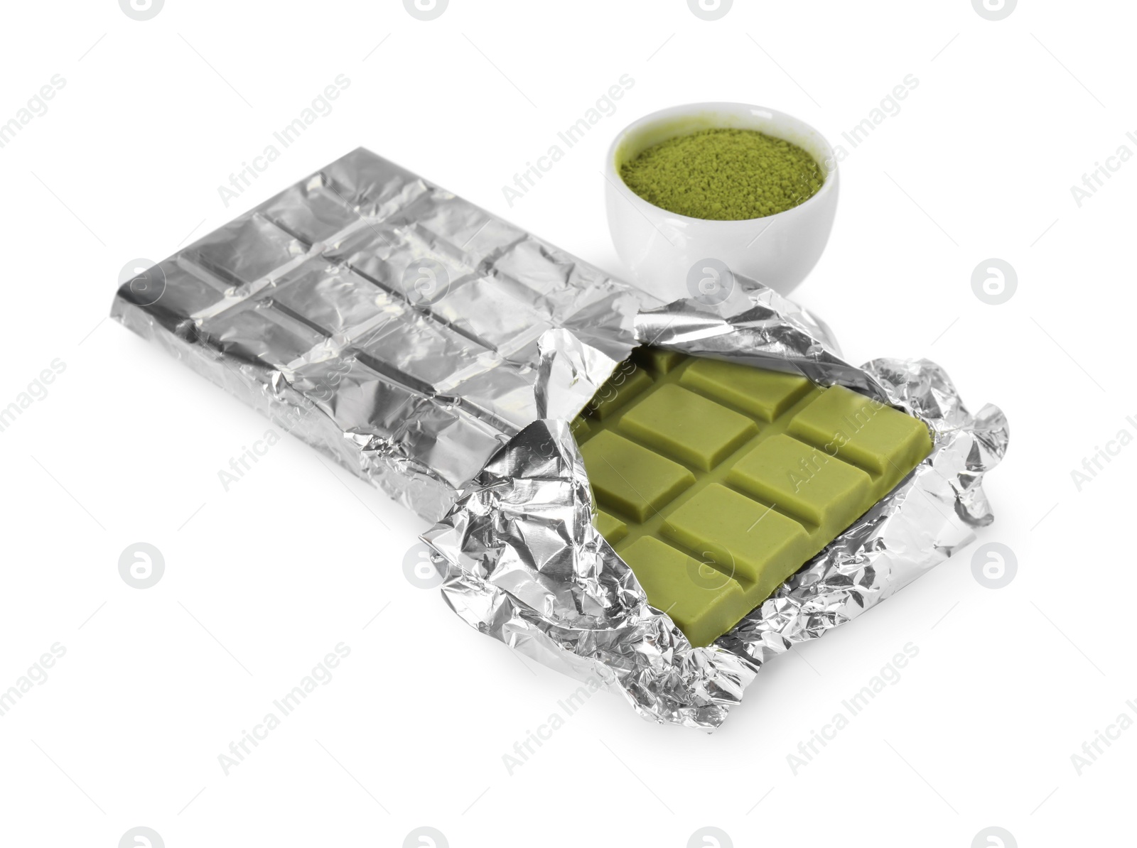 Photo of Tasty matcha chocolate bar wrapped in foil and powder isolated on white