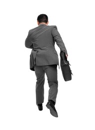Businessman with briefcase running on white background, back view