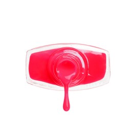 Pink nail polish dripping from bottle isolated on white