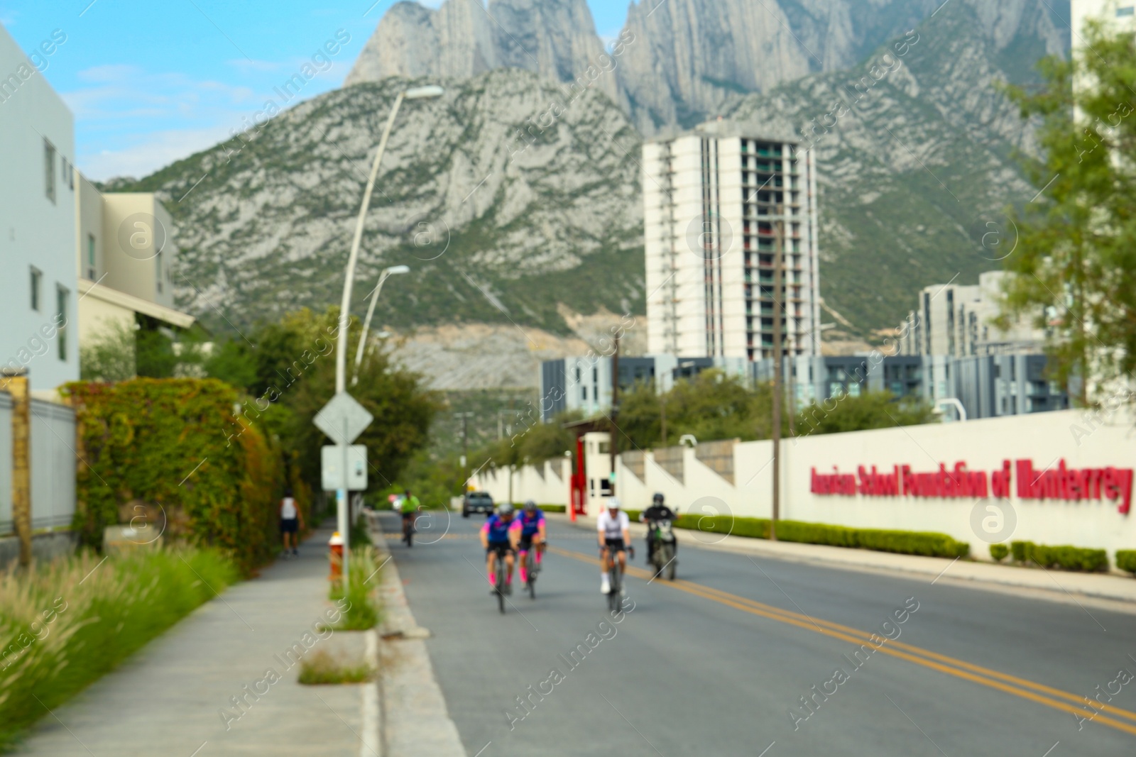 Photo of Mexico, San Pedro Garza Garcia - August 27, 2022: City street near mountains, blurred view