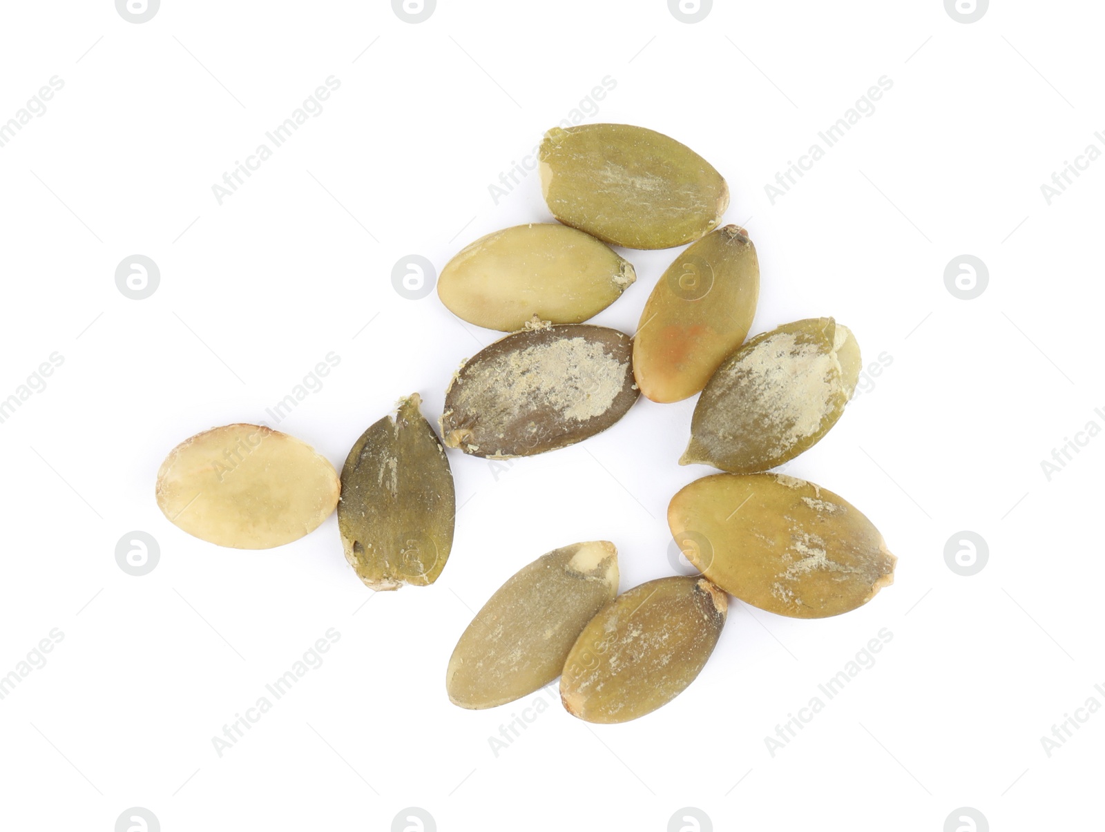 Photo of Raw peeled pumpkin seeds on white background, top view