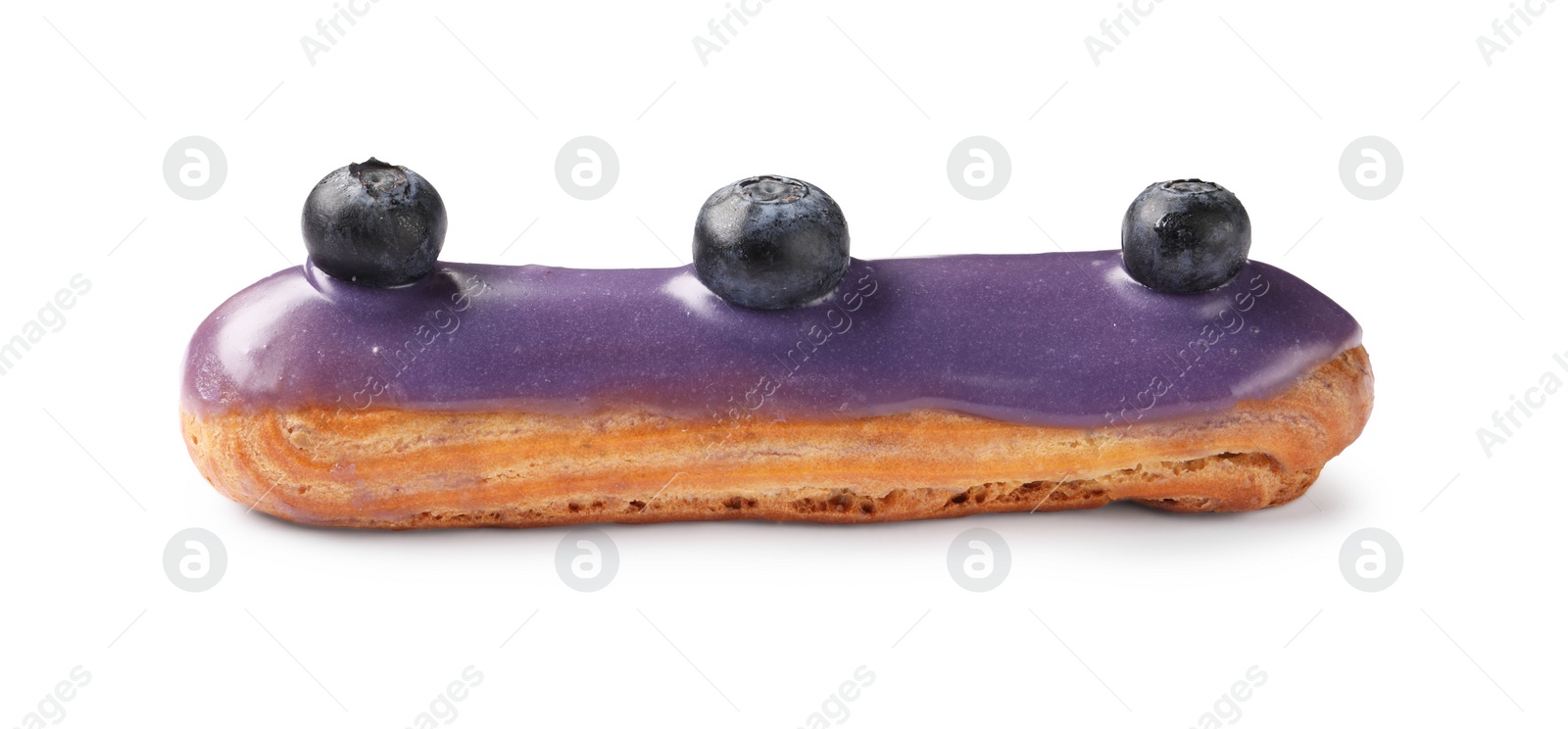 Photo of Delicious eclair decorated with blueberries isolated on white