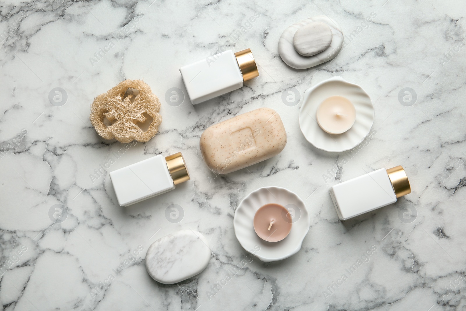 Photo of Flat lay composition with spa supplies on marble table