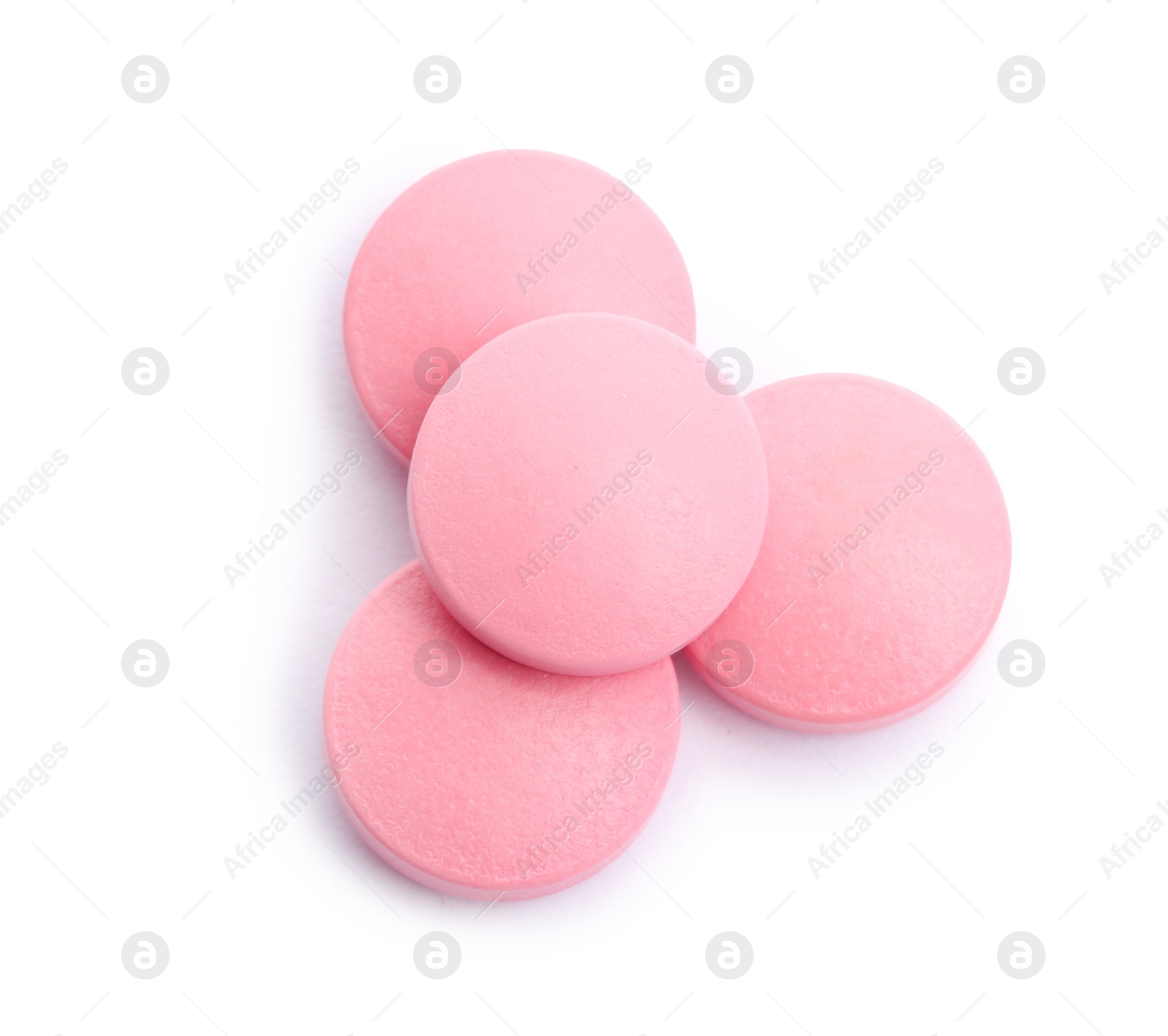 Photo of Color pills on white background, top view. Medical treatment