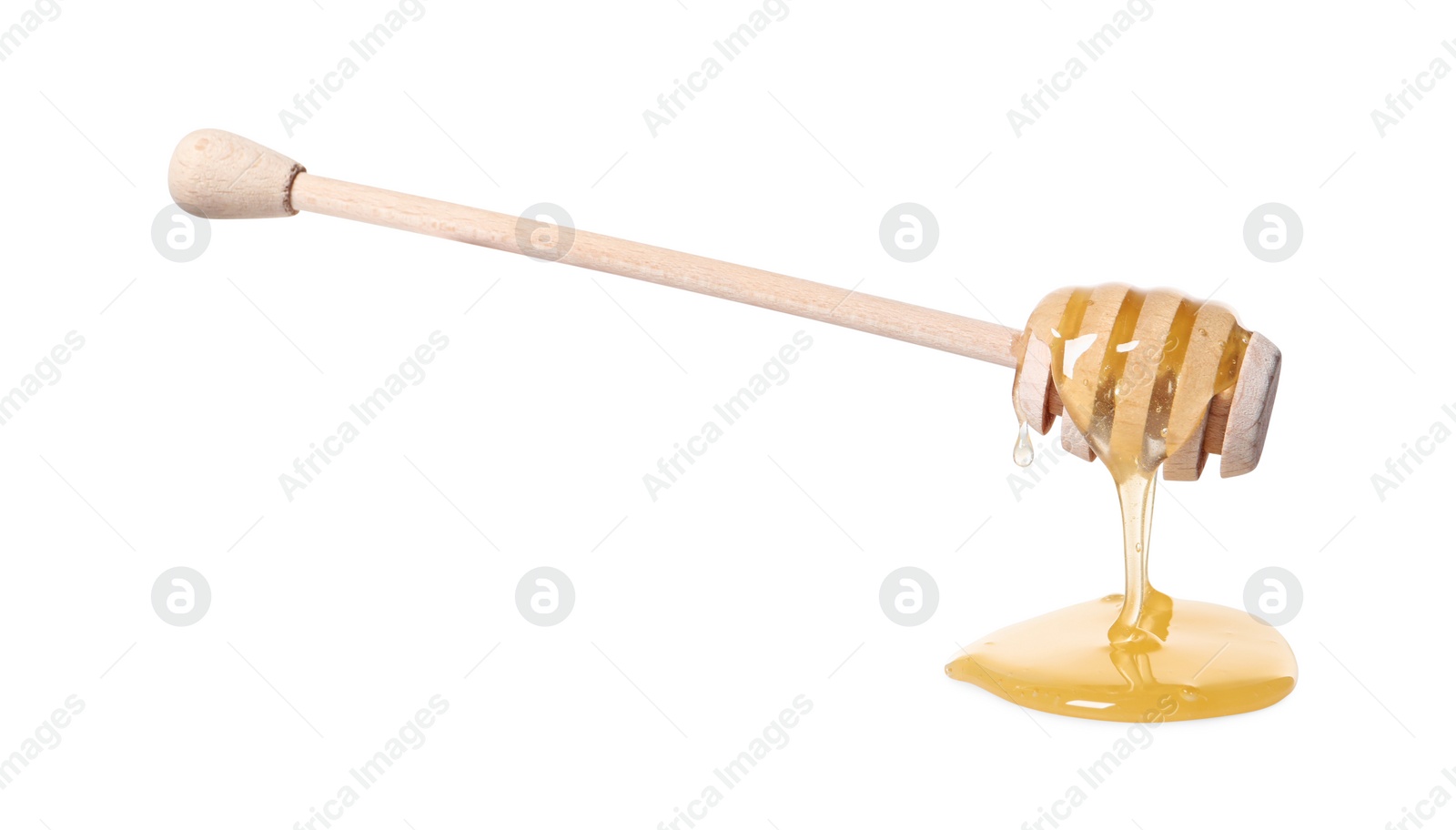 Photo of Natural honey dripping from dipper on white background