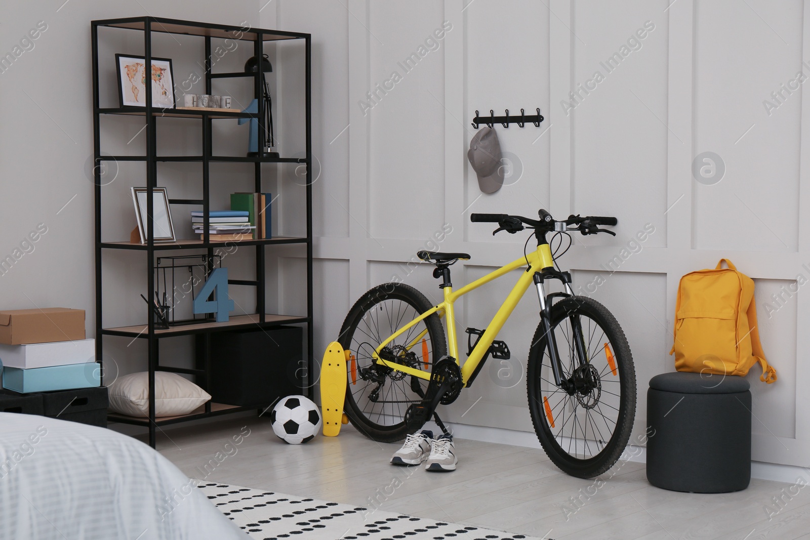 Photo of Sports equipment in stylish teenager's room interior