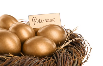 Photo of Many golden eggs in nest and card with word Retirement on white background. Pension concept
