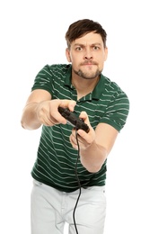 Emotional man playing video games with controller isolated on white