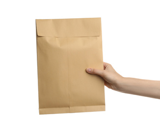 Woman holding kraft paper envelope on white background, closeup