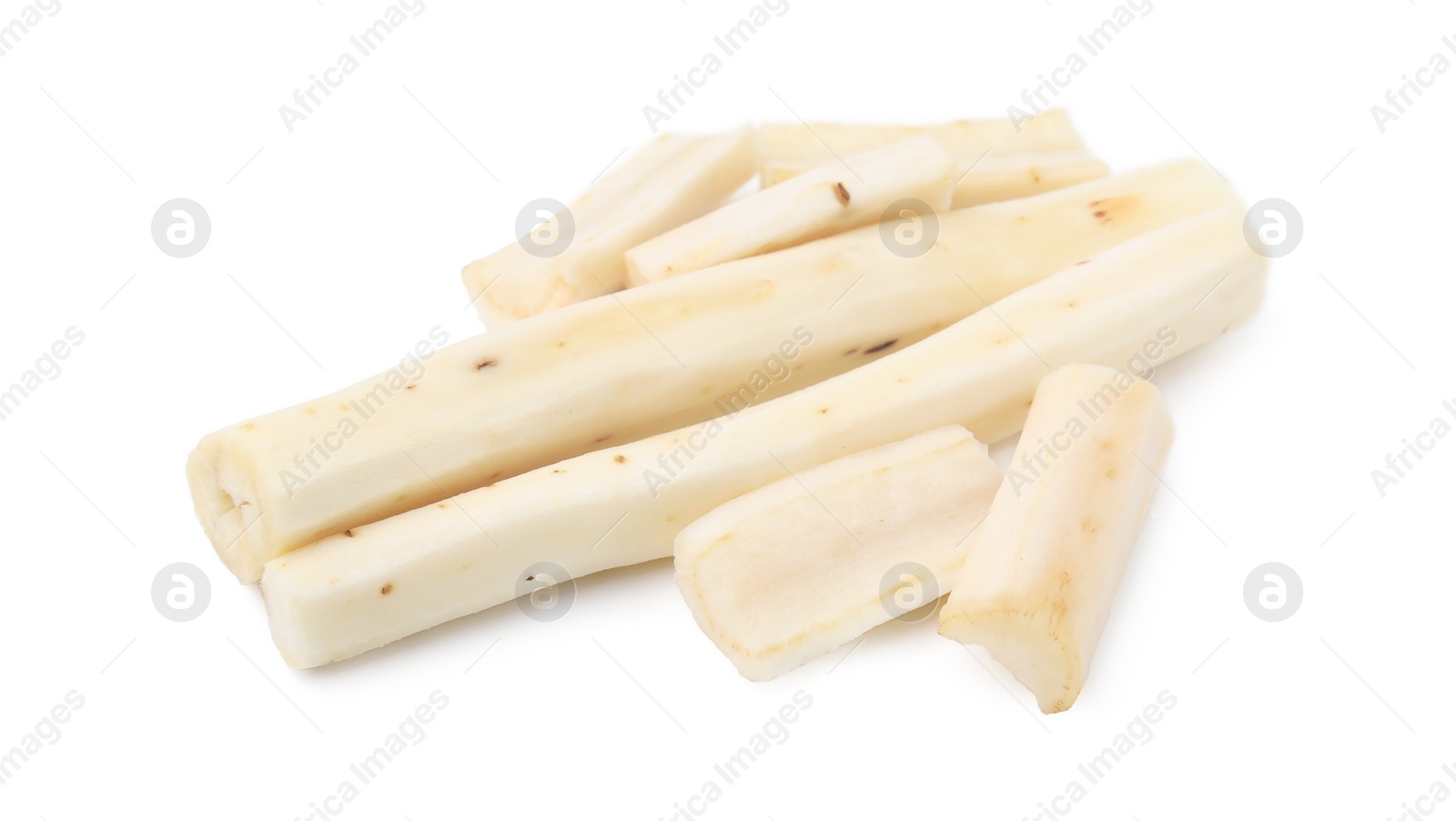 Photo of Cut raw salsify roots isolated on white