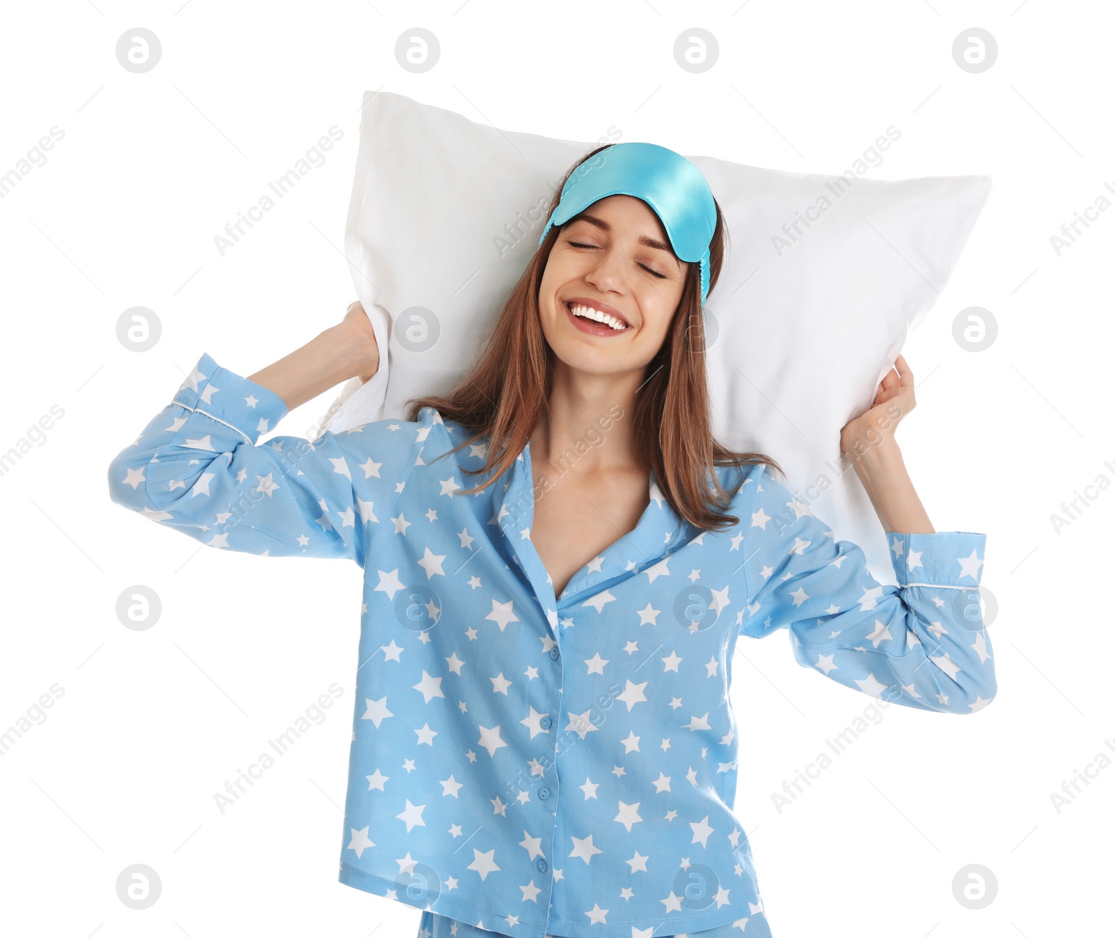 Photo of Beautiful woman with pillow and sleep mask on white background. Bedtime