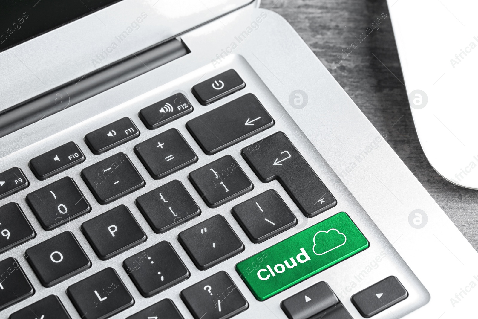 Image of Cloud technology. Closeup view of modern laptop keyboard on table