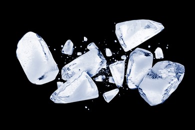 Crushed ice in air on black background